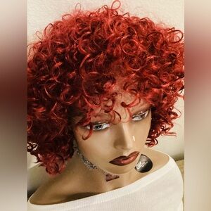 Curly wigs with bangs 
It can be used for daily any other occasion synthetic.